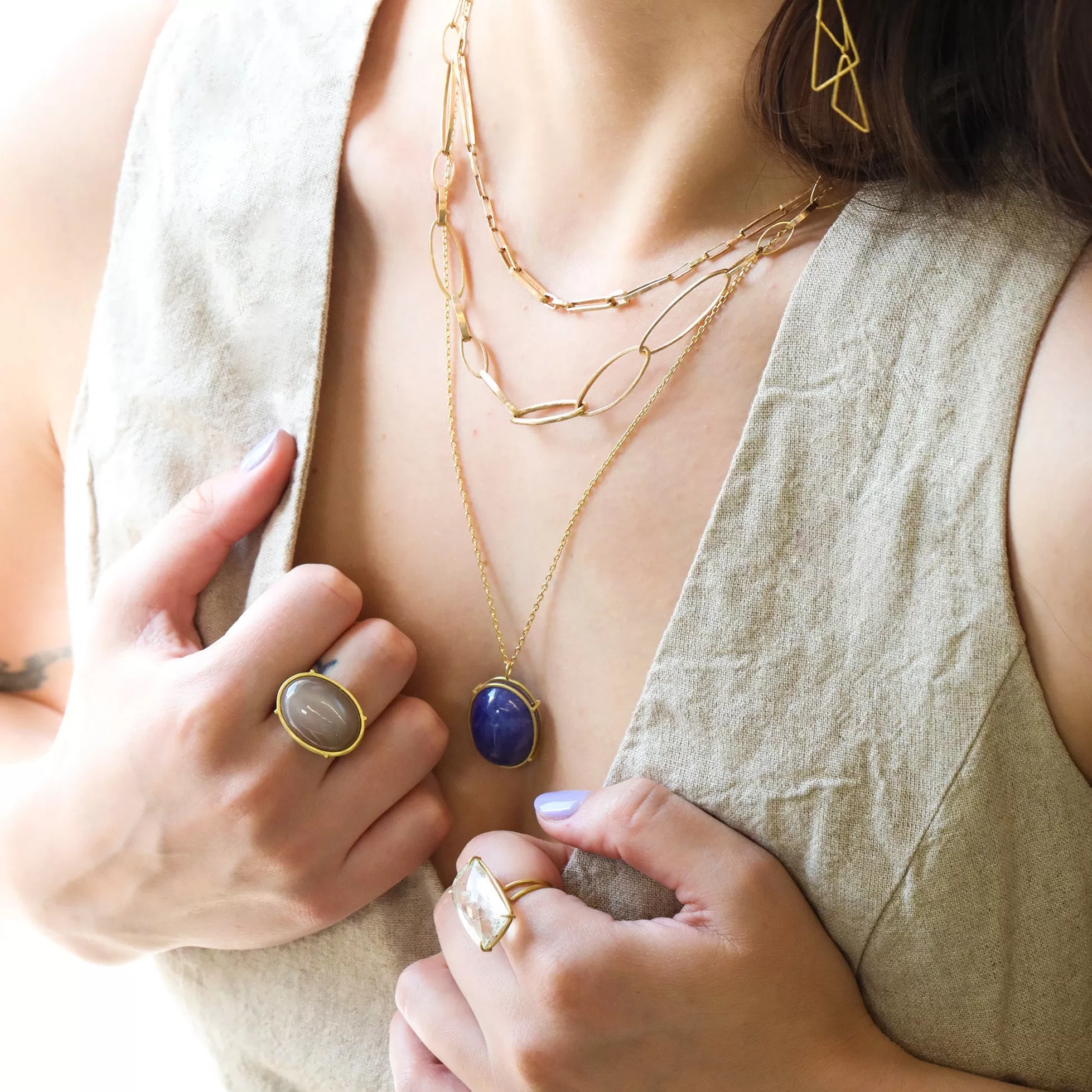 Chocolate Cabochon Moonstone in 18 Karat Yellow Gold Cage Setting